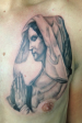Black and grey virgin mary religious tattoo
